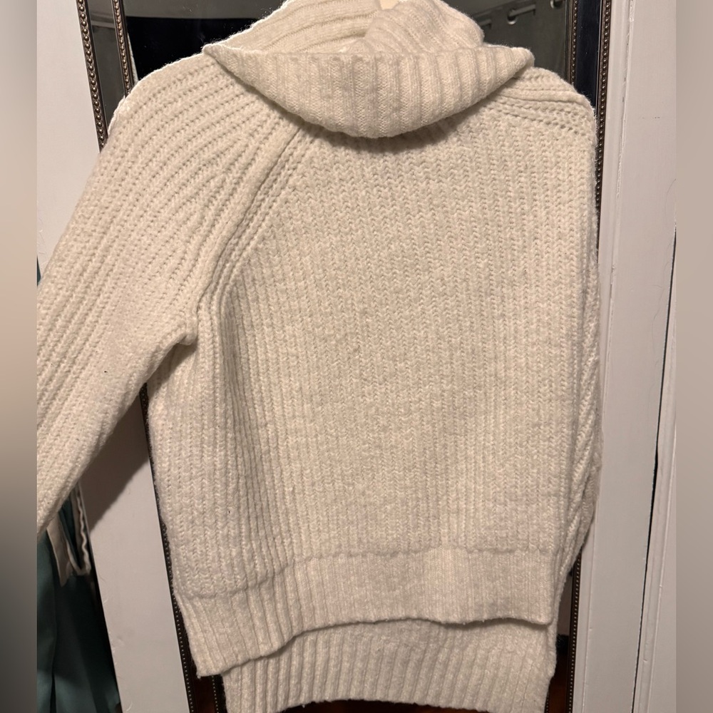 White turtleneck sweater